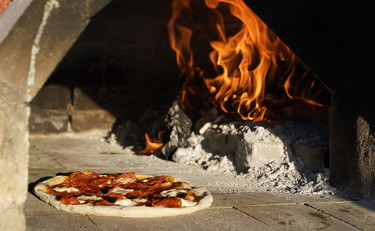 Batterio nella pizza surgelata, in Francia muoiono due bambini