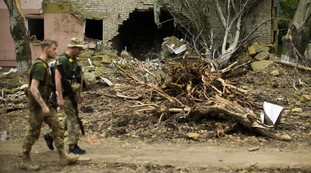 Cadaveri ammucchiati nel supermercato. L'accusa ai russi è agghiacciante