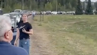 Scatta la fuga dalla Russia: proteste e code al confine