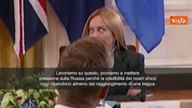 meloni alza occhi al cielo quando merz spiega a trump guerra in ucraina espressione diventa virale