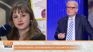 Dritto e Rovescio, brucia la foto della Meloni. Del Debbio all'attivista: Io non lo farei mai