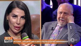 Il duello cult tra Caprarica e la escort: È una terapeuta?